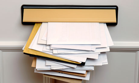 Letterbox with lots of mail